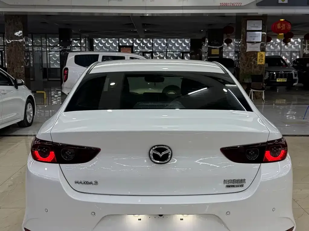 Mazda 3 Axela — фото 4