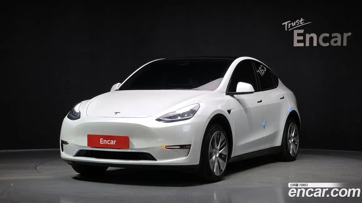 Tesla Model Y — фото 1