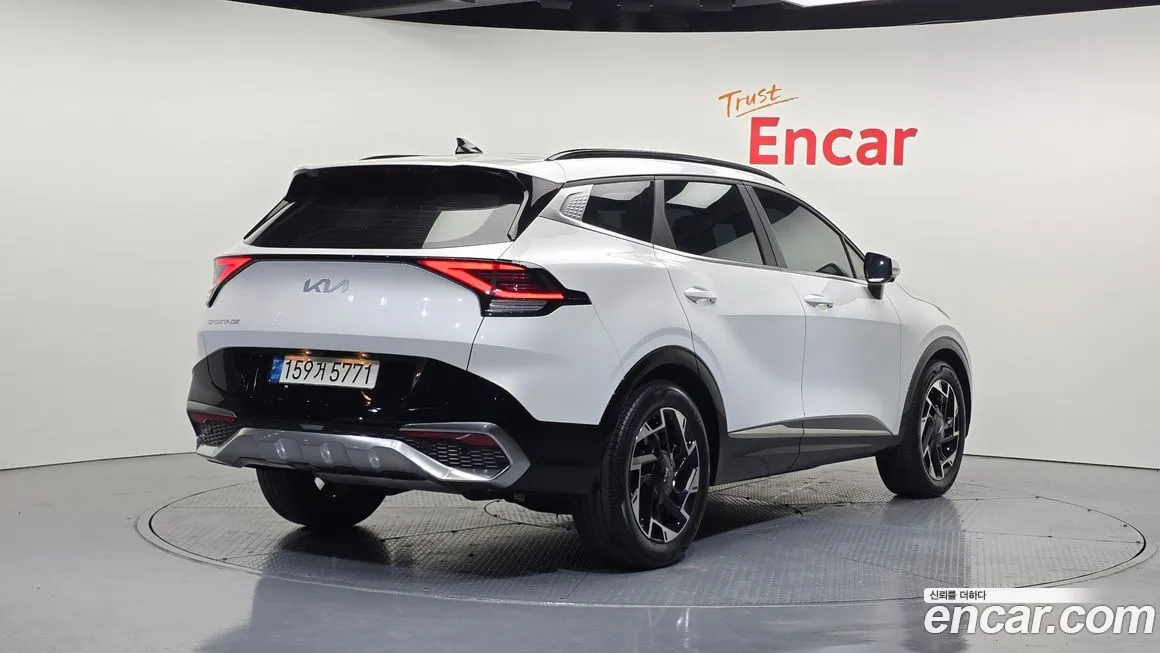 Kia Sportage — фото 9
