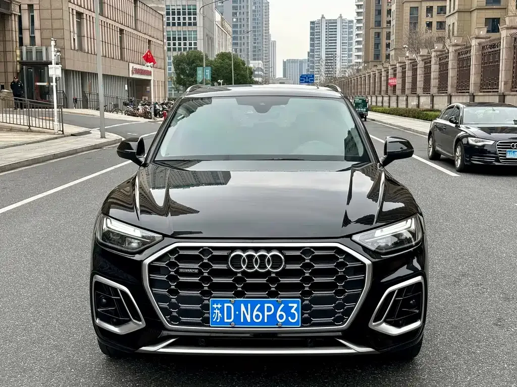 Audi Q5L — фото 10