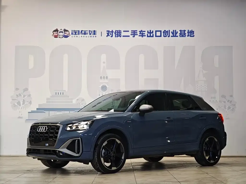Audi Q2L — фото 1