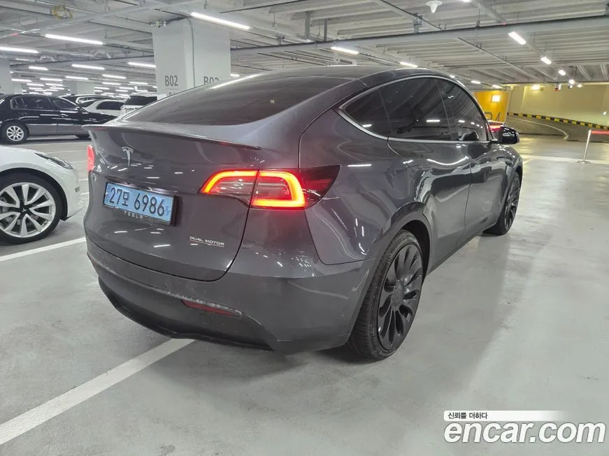 Tesla Model Y — фото 6