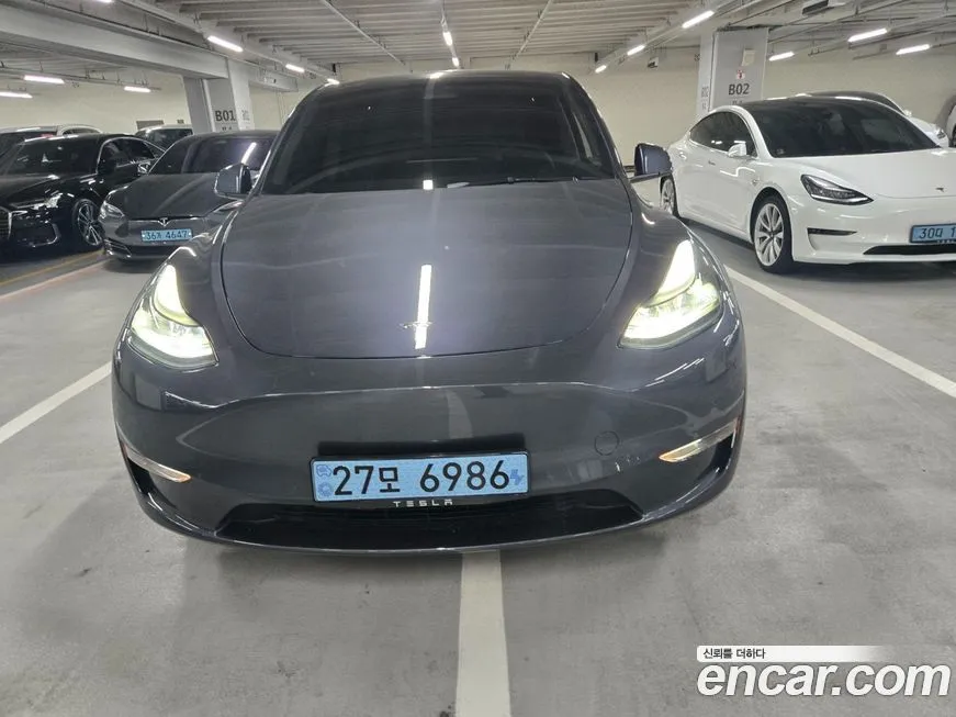 Tesla Model Y — фото 5