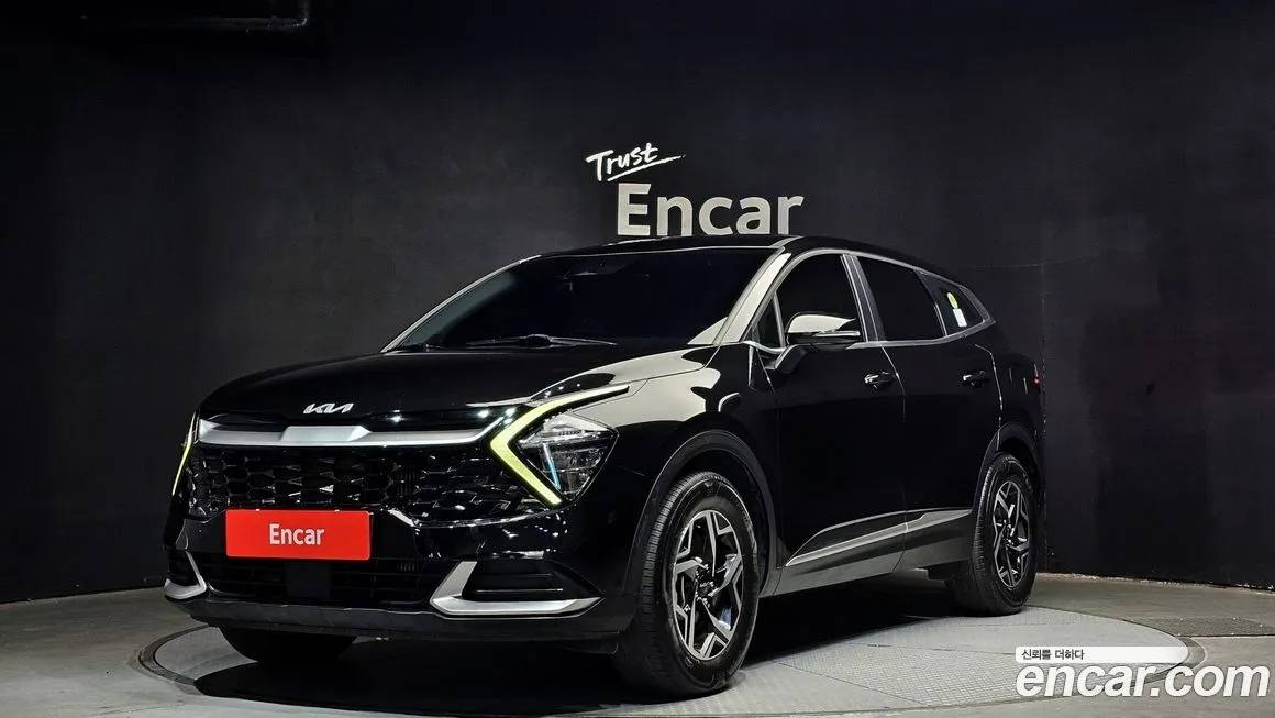 Kia Sportage — фото 1