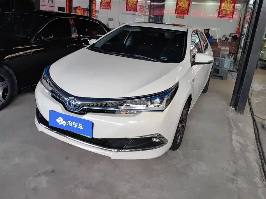 Toyota Corolla Hybrid — фото 1