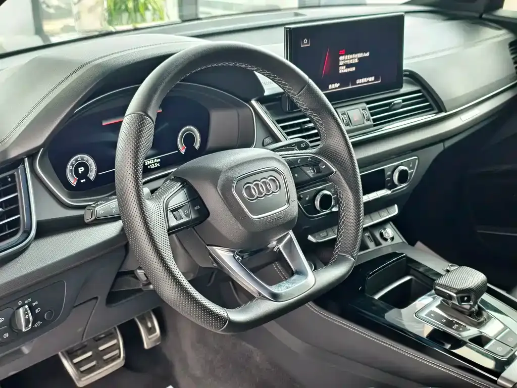 Audi Q5L — фото 5