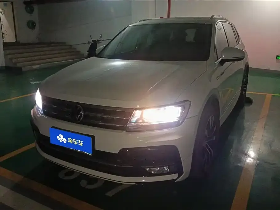 Volkswagen Tiguan L New Energy — фото 1