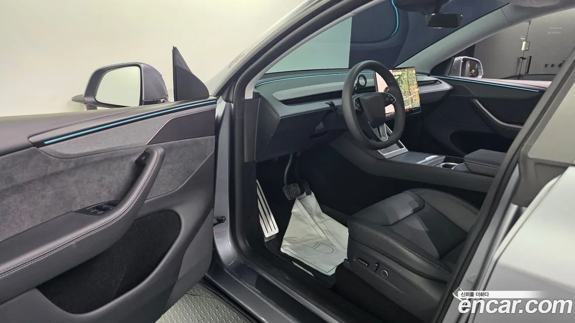 Tesla Model Y — фото 10