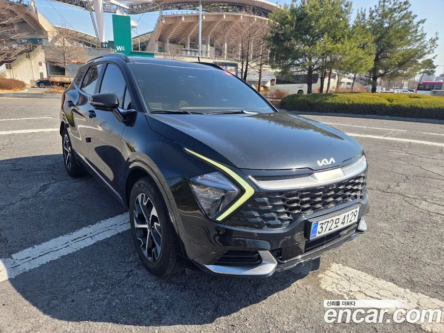 Kia Sportage — фото 1