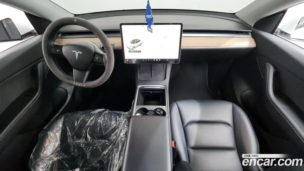 Tesla Model Y — фото 10
