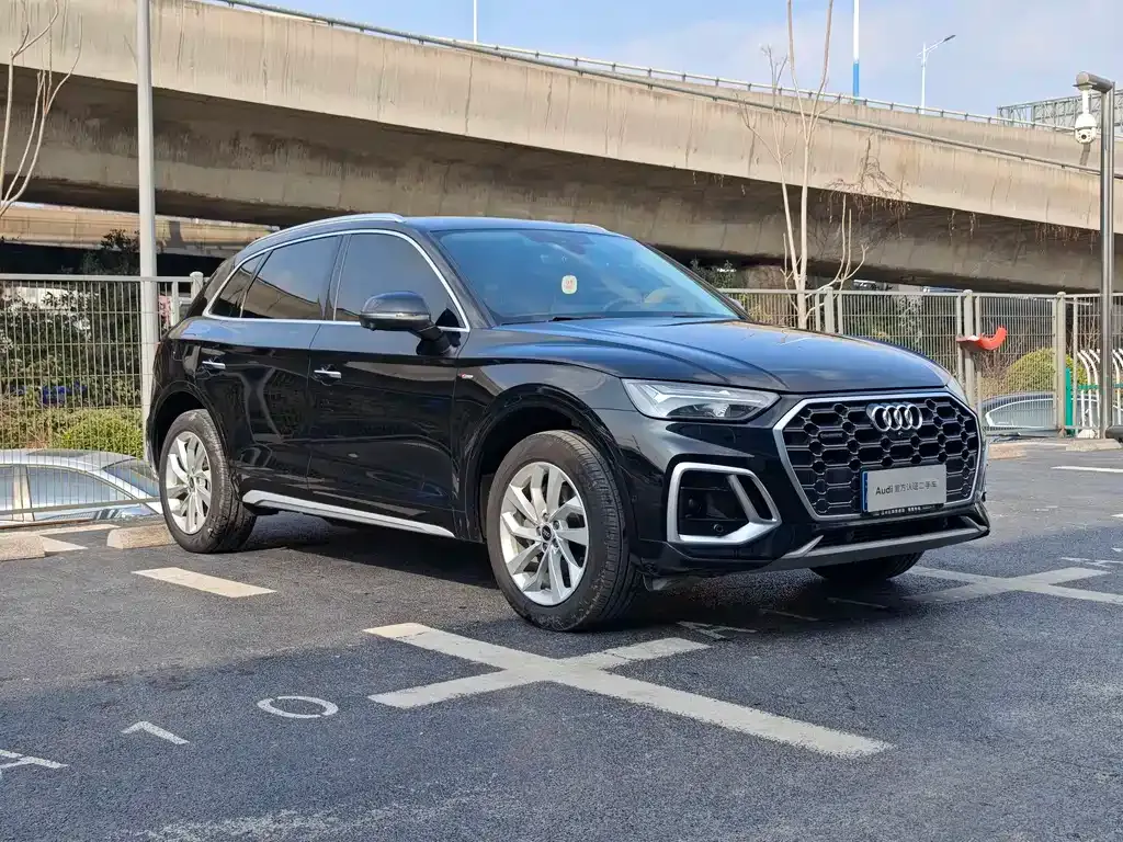 Audi Q5L — фото 6