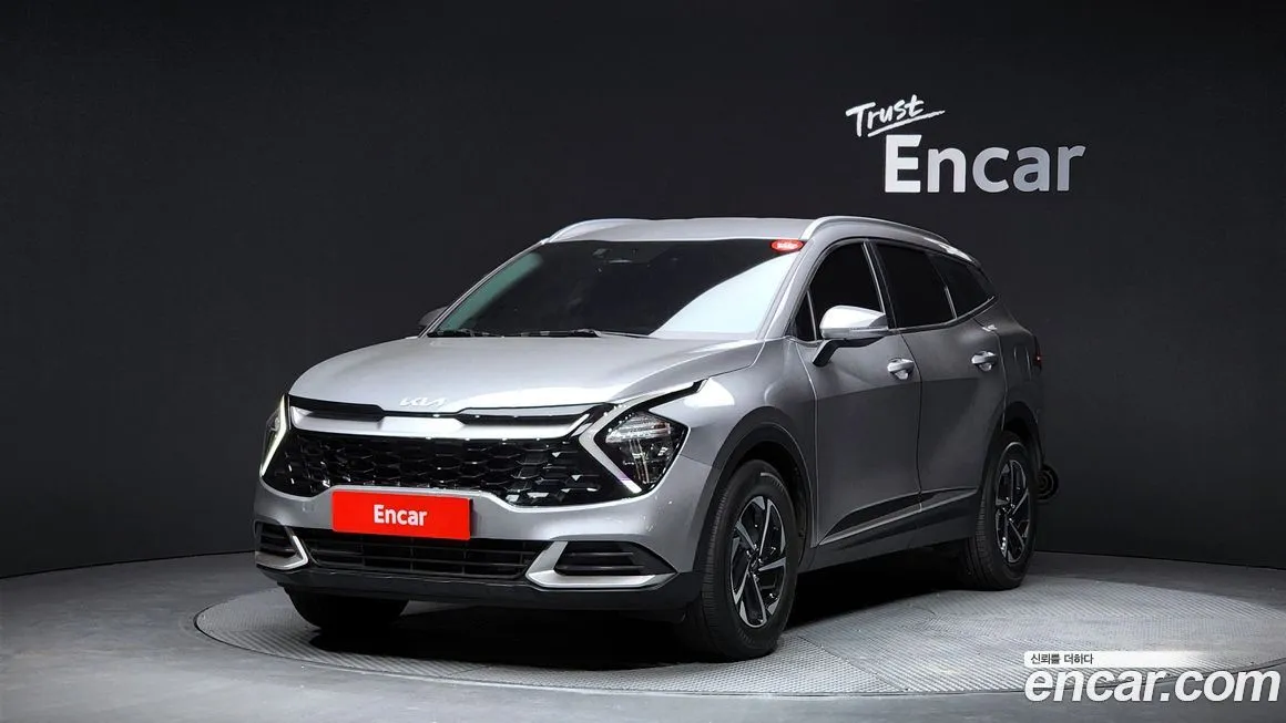 Kia Sportage — фото 1