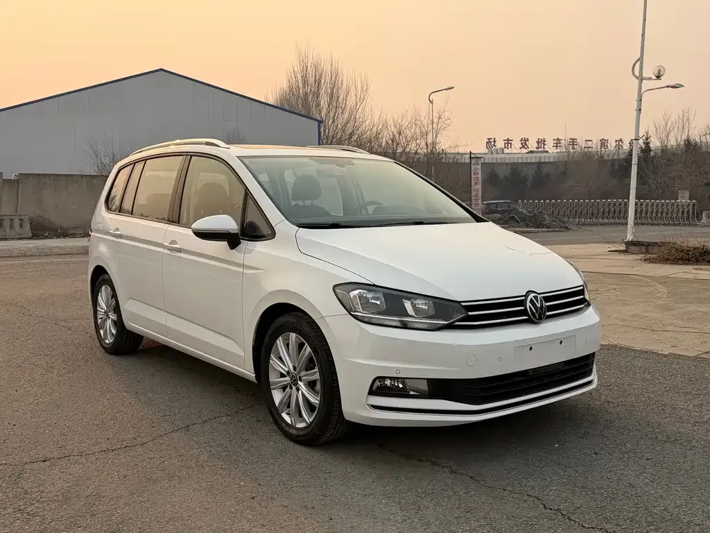 Volkswagen Touran — фото 5