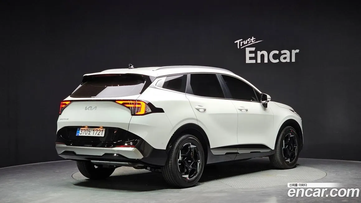 Kia Sportage — фото 7