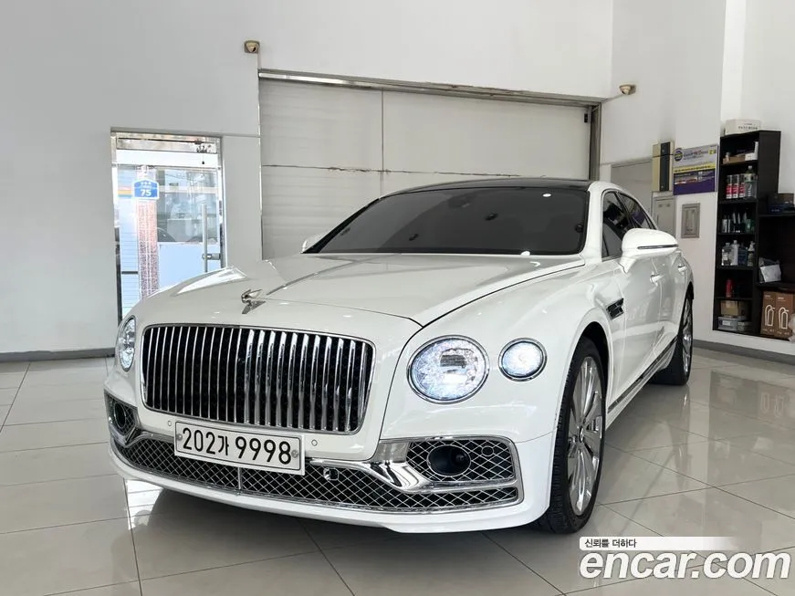 Bentley Flying Spur — фото 1