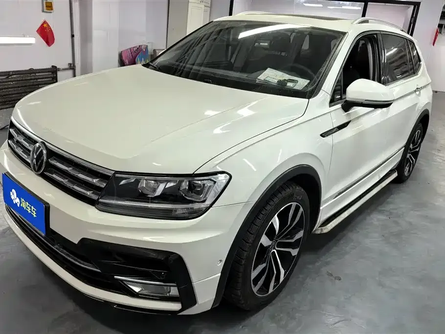 Volkswagen Tiguan L — фото 1