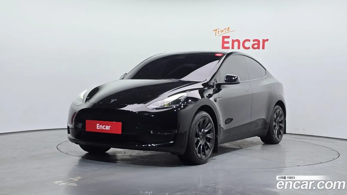 Tesla Model Y — фото 1