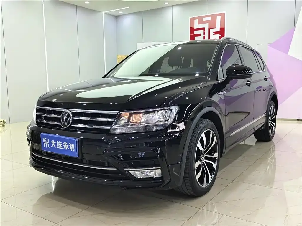 Volkswagen Tiguan L — фото 1