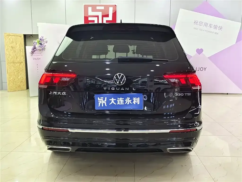Volkswagen Tiguan L — фото 10