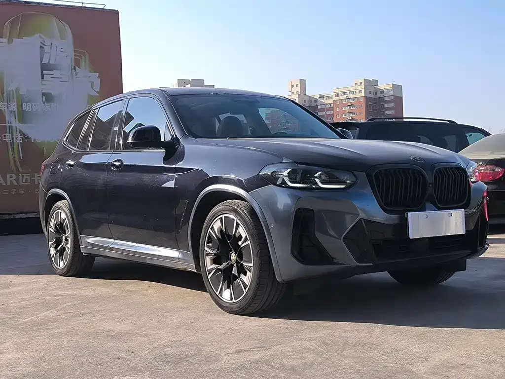 BMW iX3 — фото 8