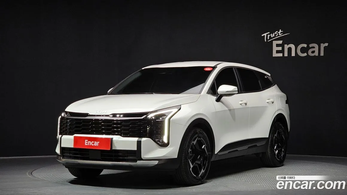 Kia Sportage — фото 1