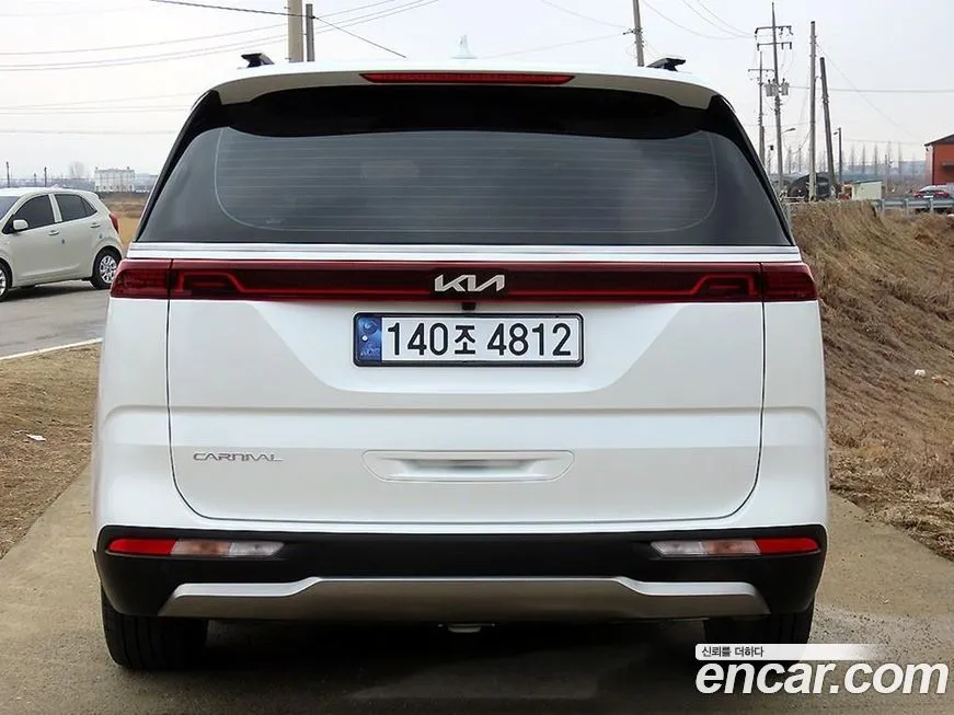 Kia Carnival — фото 5