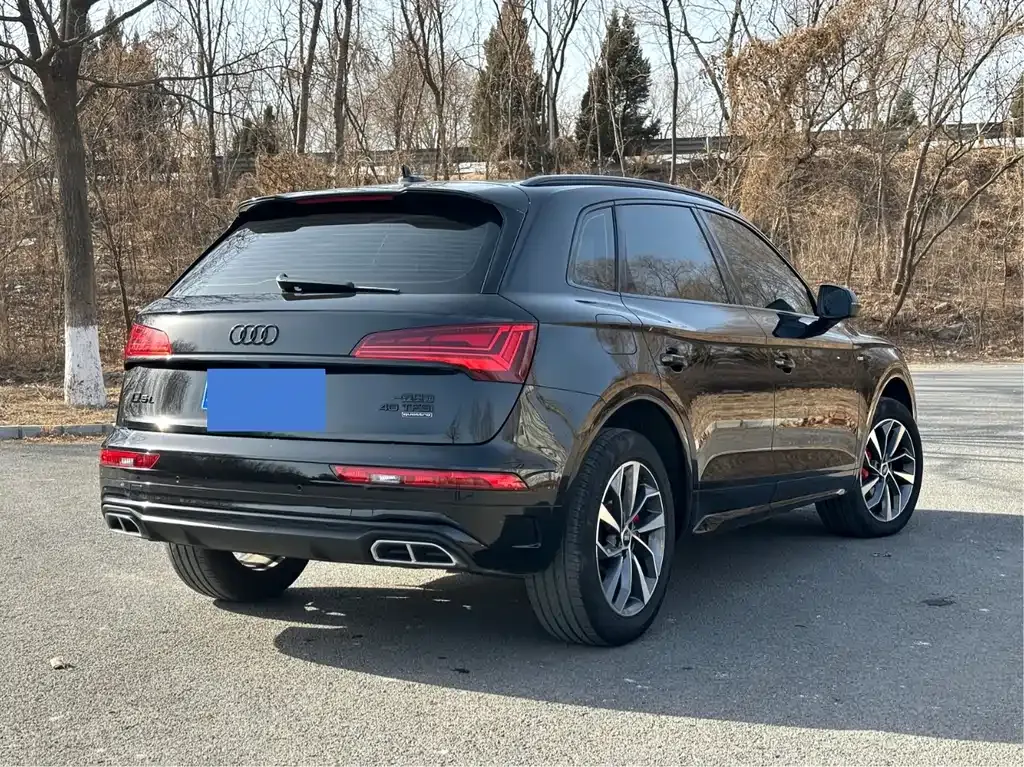 Audi Q5L — фото 10