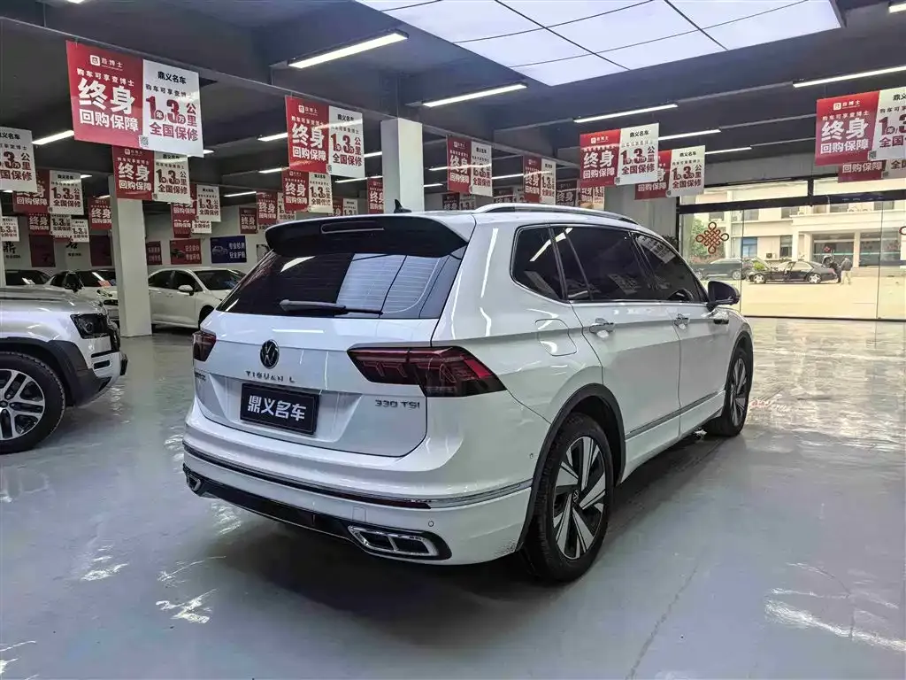 Volkswagen Tiguan L — фото 4