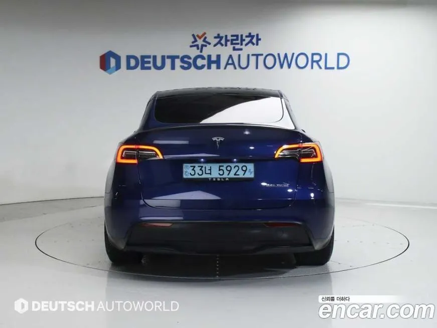 Tesla Model Y — фото 5