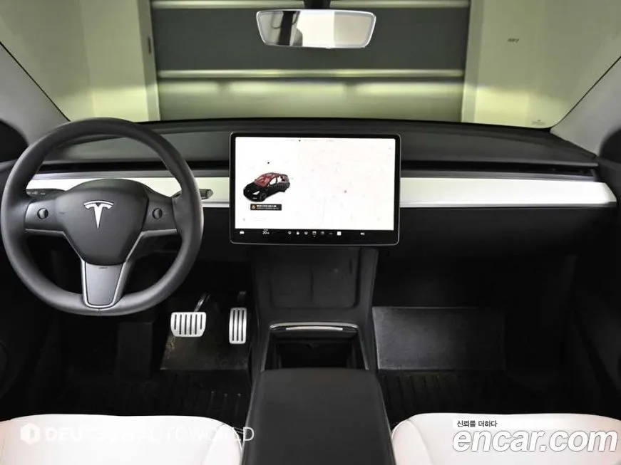 Tesla Model Y — фото 10