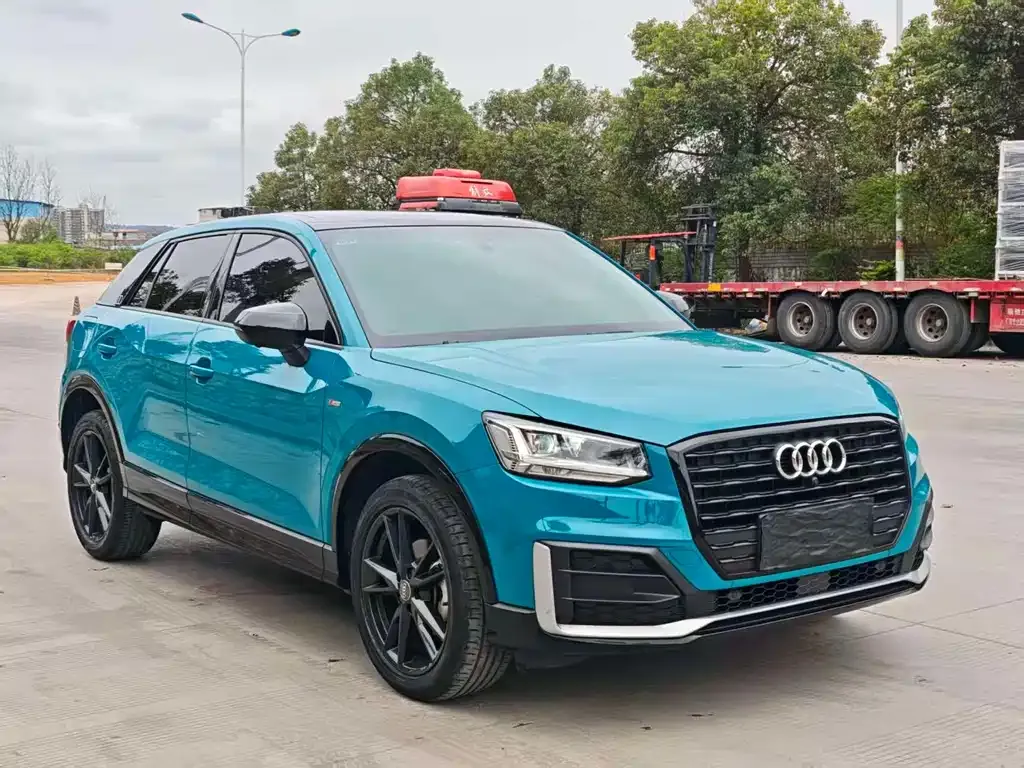 Audi Q2L — фото 7