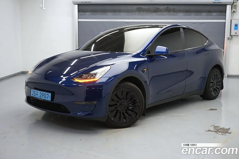 Tesla Model Y — фото 1
