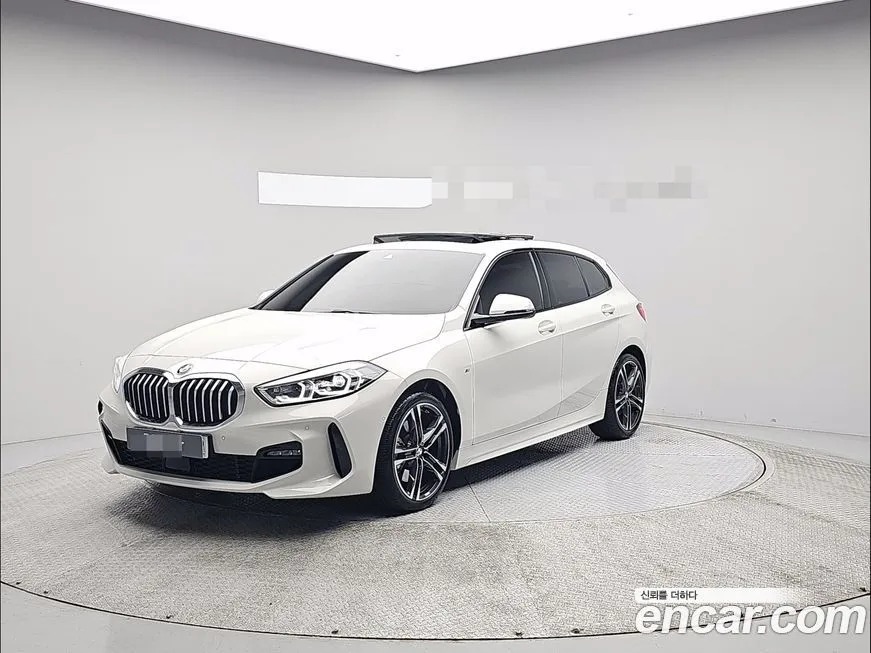 BMW 1-Series — фото 1