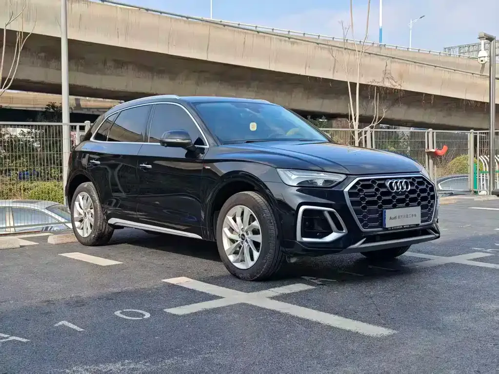 Audi Q5L — фото 5