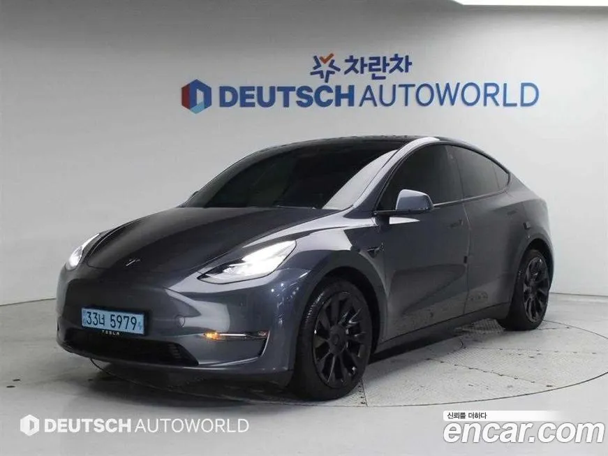 Tesla Model Y — фото 1