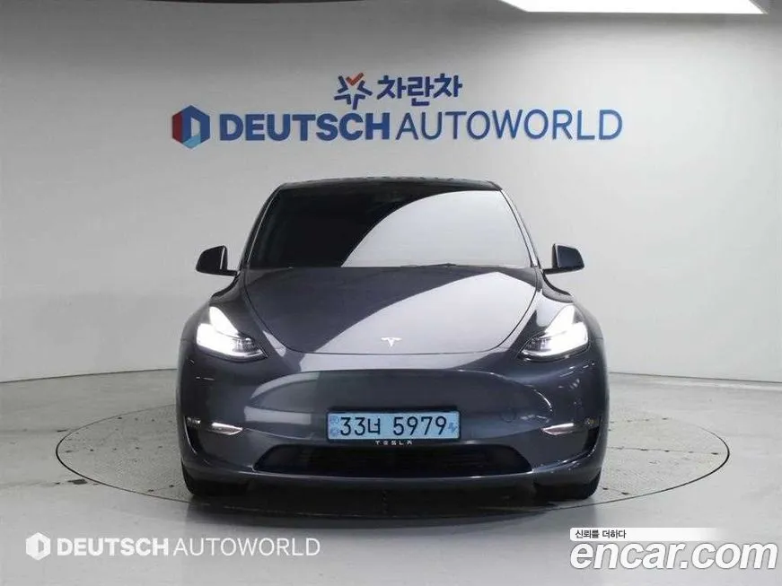 Tesla Model Y — фото 6