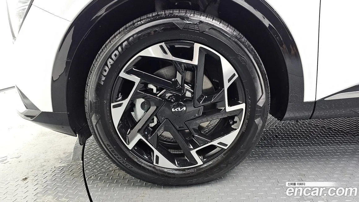Kia Sportage — фото 10