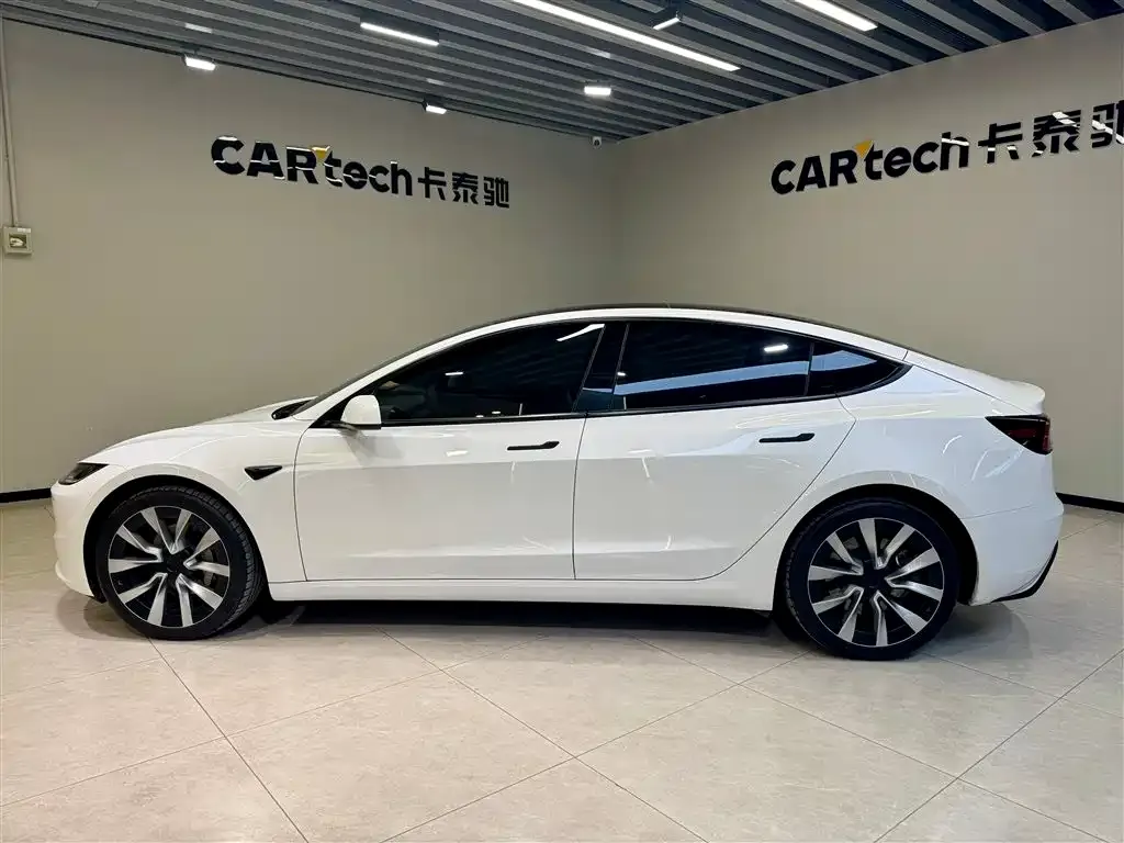 Tesla Model 3 — фото 10