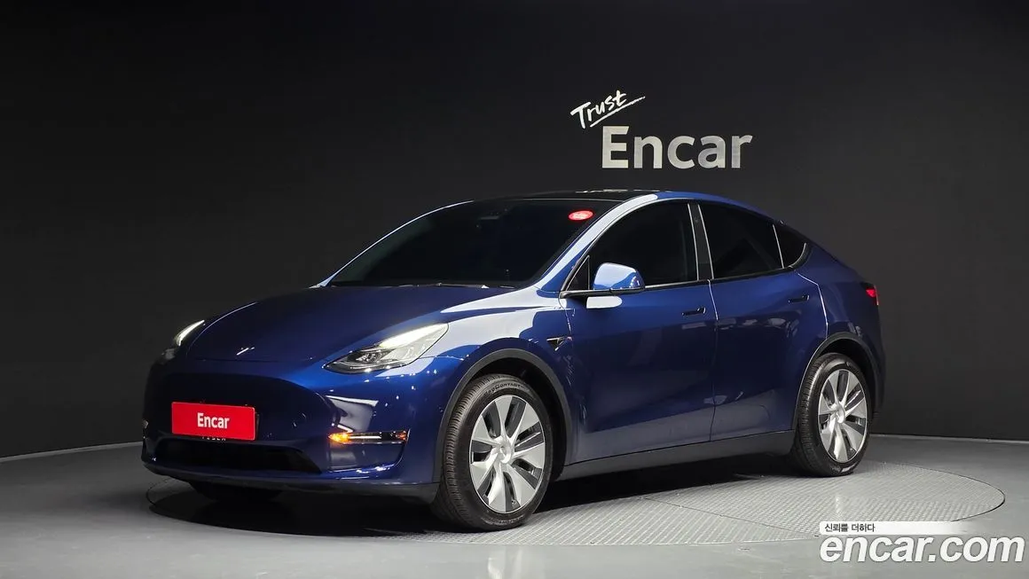 Tesla Model Y — фото 1