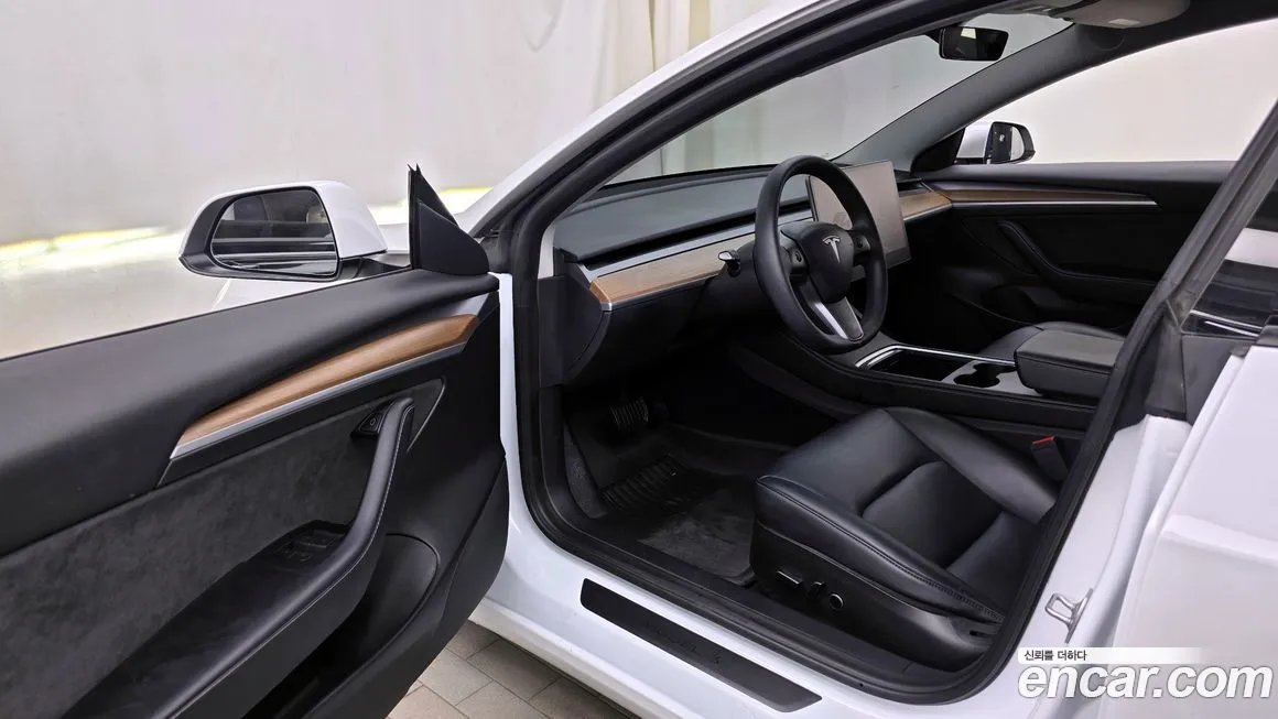 Tesla Model 3 — фото 4