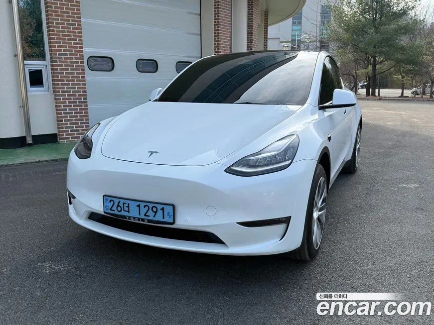 Tesla Model Y — фото 8
