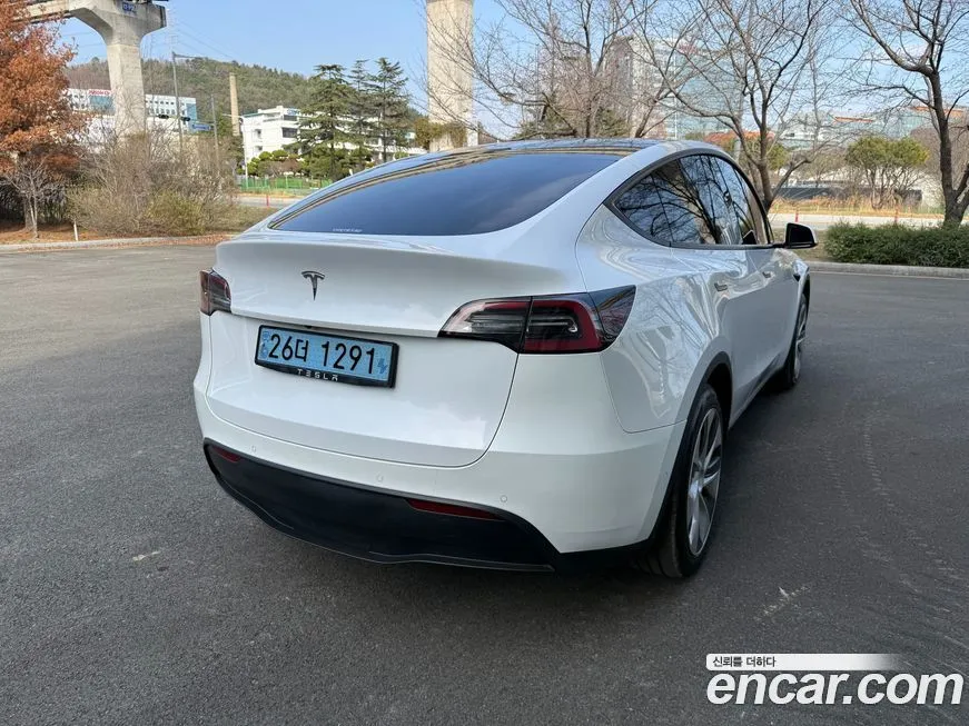 Tesla Model Y — фото 5