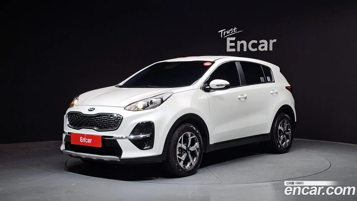Kia Sportage — фото 1