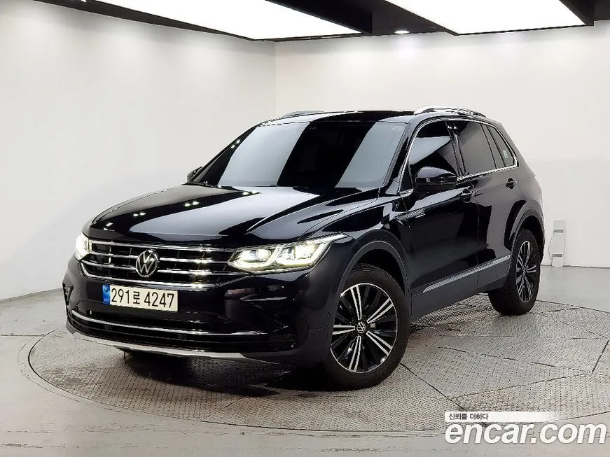 Volkswagen Tiguan — фото 1