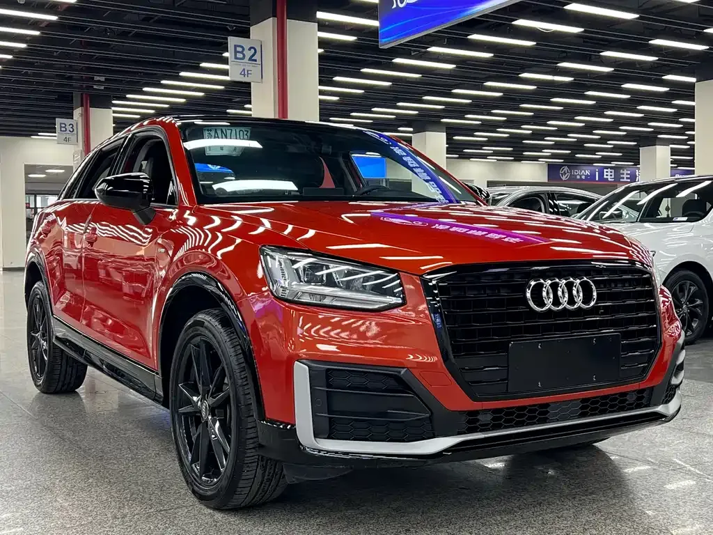 Audi Q2L — фото 10