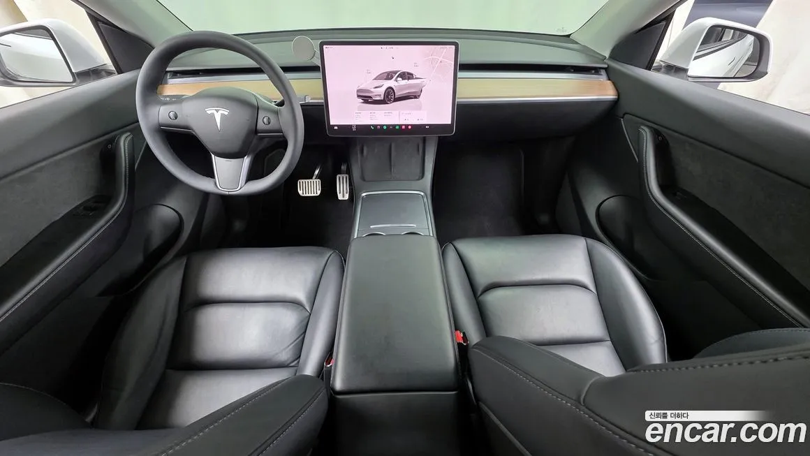 Tesla Model Y — фото 7