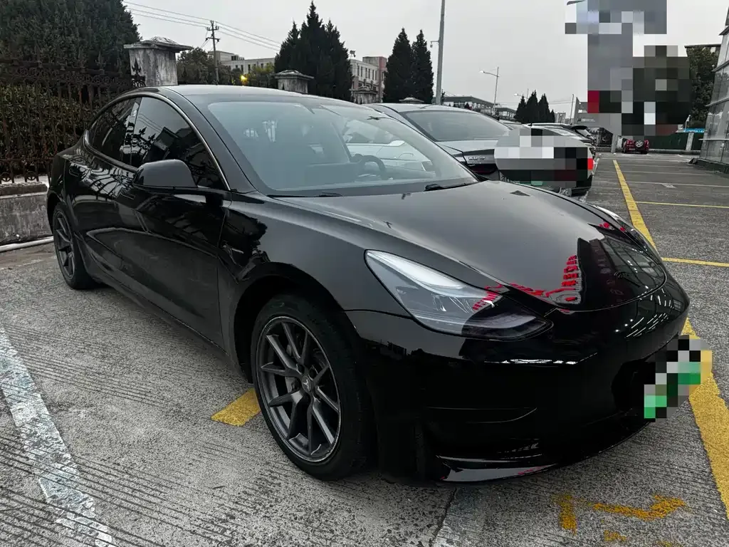 Tesla Model 3 — фото 10