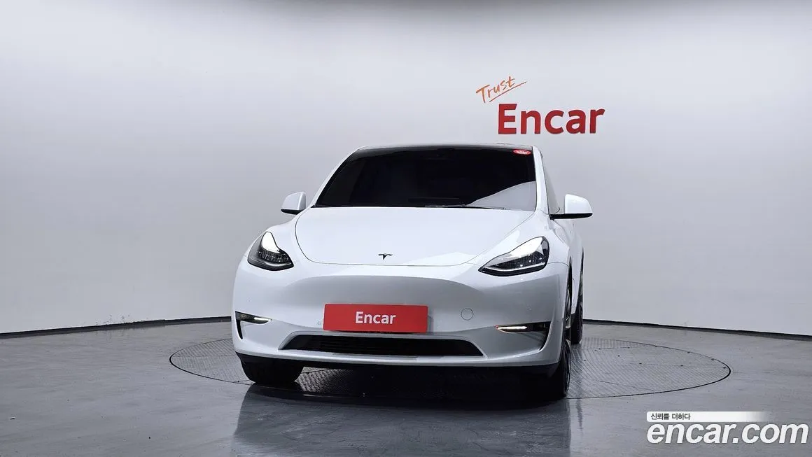 Tesla Model Y — фото 10