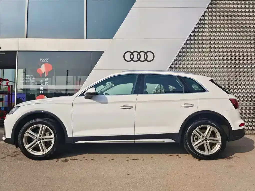 Audi Q5L — фото 5