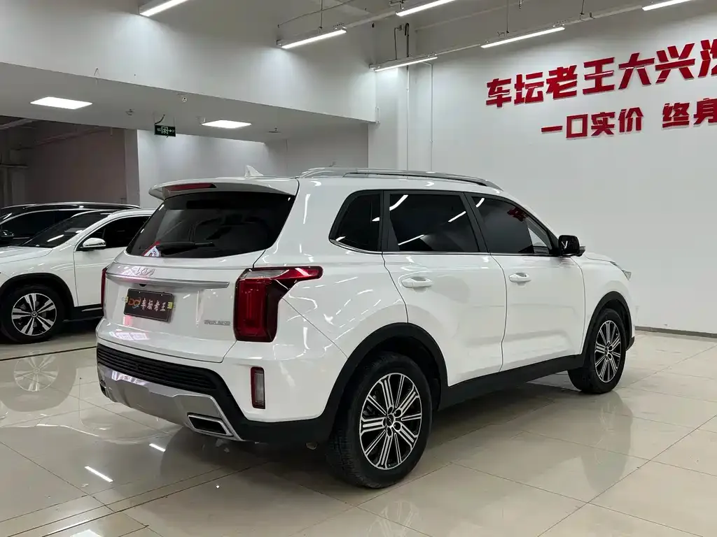 Kia Sportage — фото 10